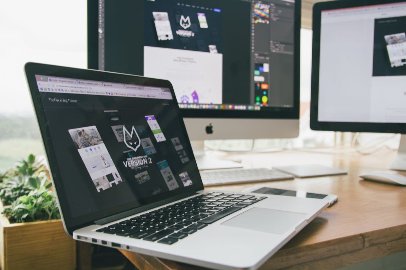 Roofing company website open on a laptop and a phone side by side