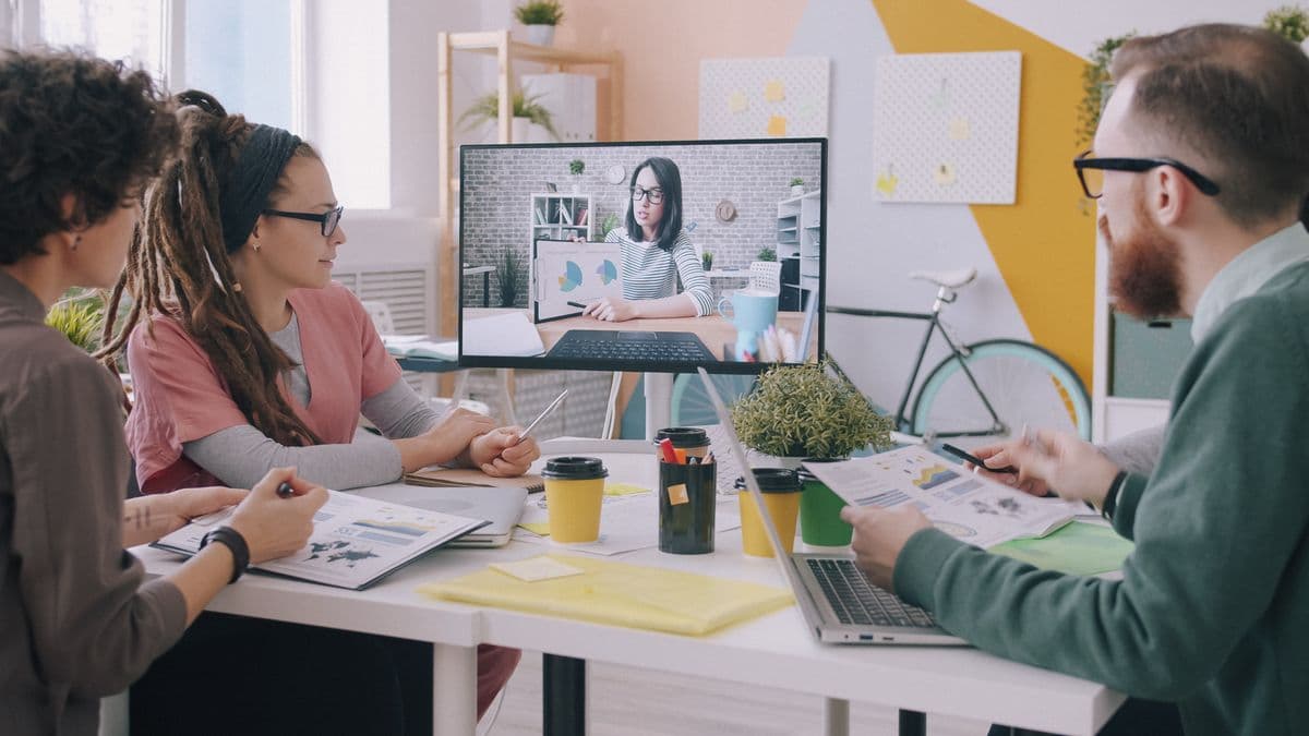 Roofing SEO Services team reviewing a roofer’s Google Maps rankings on a video call