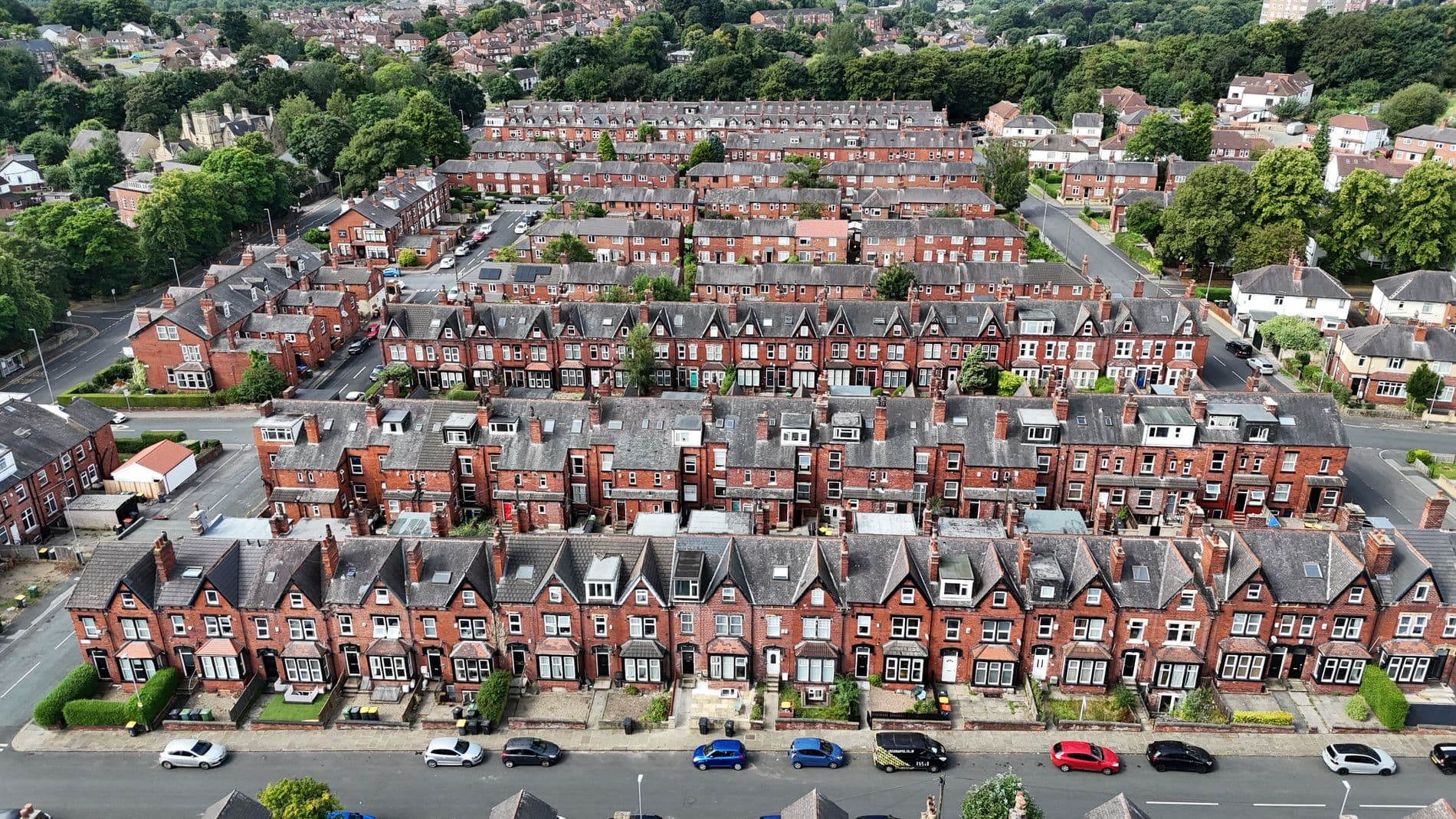 Aerial view of rows of red-brick terraced houses in Leeds