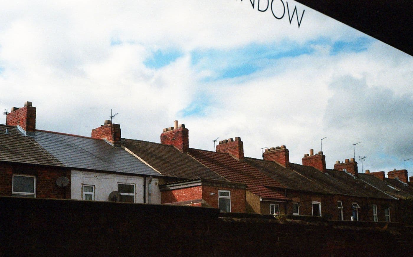 Victorian terrace rooftops and chimneys in the UK